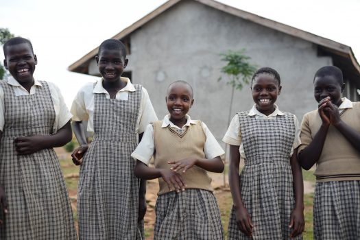 Group of young girls from Ndhiwa smiling together